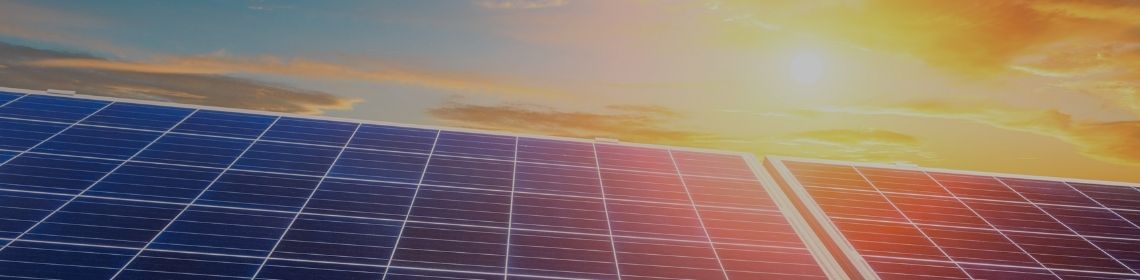 Solar panel closeup with sunset in the background