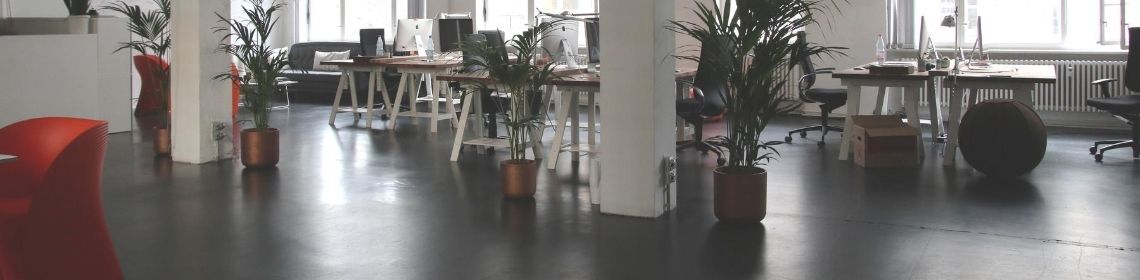 Modern office environment with desks and chairs