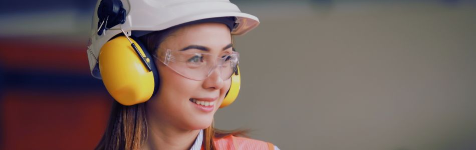 professional lady wearing safety glasses and helmet
