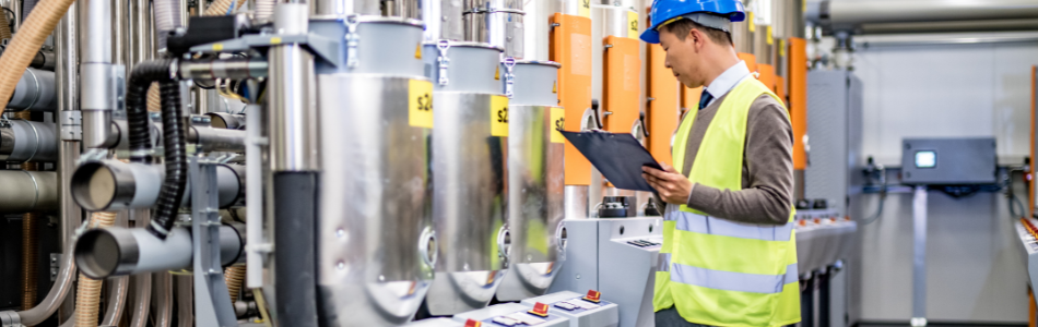 person inspecting machinery and pressure vessels
