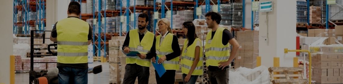 Workers standing together